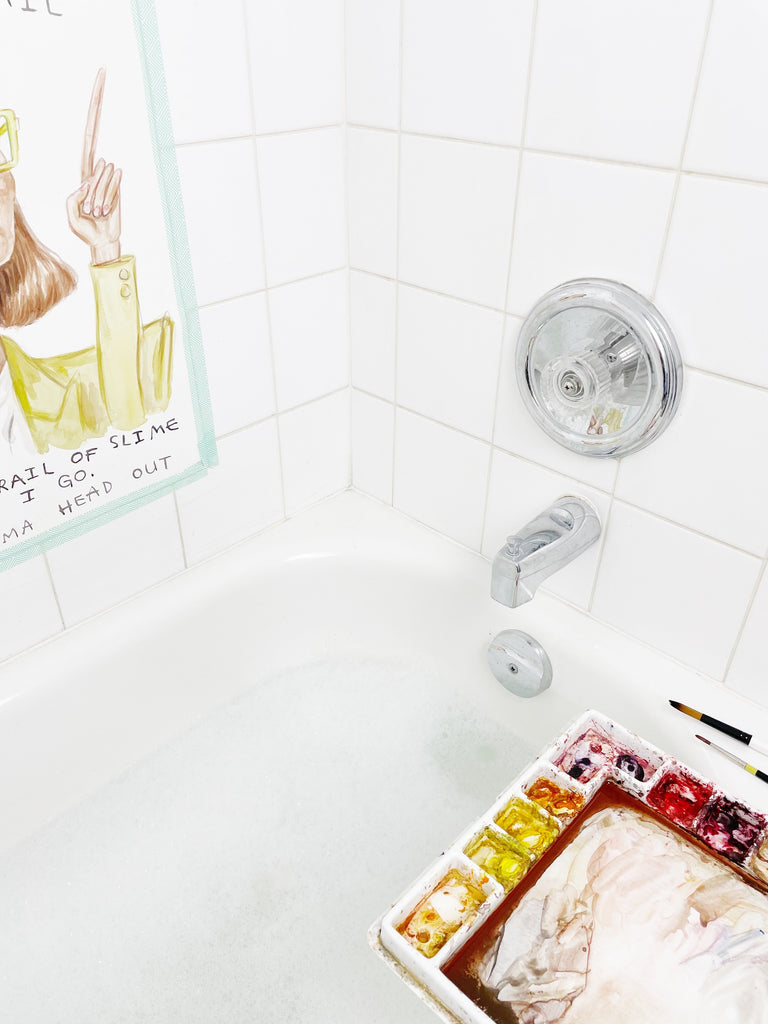 Paintings being made in the bathtub. Watercolour art in the bath