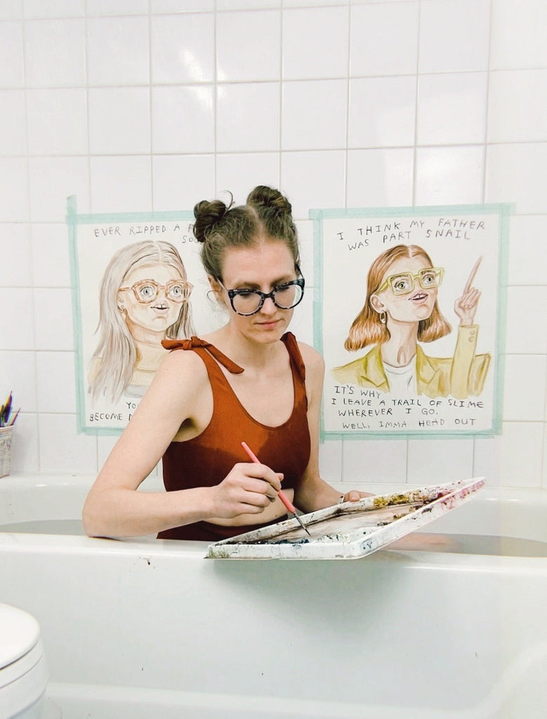 Artist Heather Buchanan painting in the Bath of her Calgary art studio